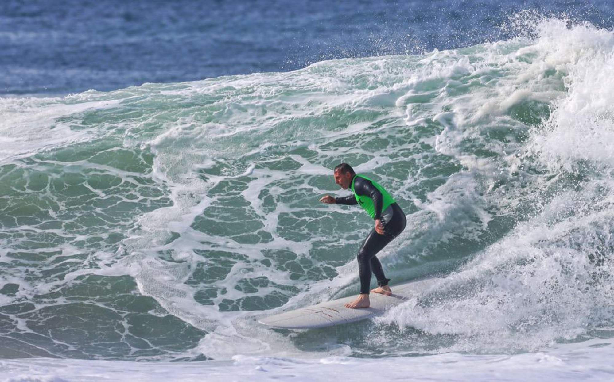 <p>Prime Minister Abbott rides the waves in the 'Wipeout Dementia Surf Off' in the town of Queenscliff in Victoria over the weekend.</p>
