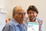 Resthaven client, Theodore Sabatini, assisted by Resthaven Western Community Services manager, Franco Parenti, to use the &#145;Ciao&#146; App.