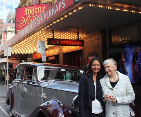 <p>Benetas Gladswood Lodge resident, Sheila Best, with Benetas Community Coordinator, Gagan Ruzeu, at Her Majesty's Theatre.</p>
