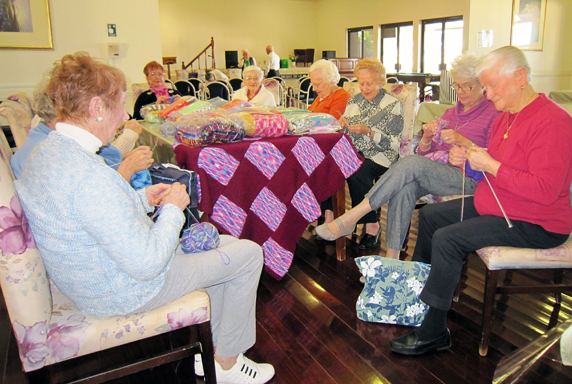 <p>The knitting group at Wisteria Grove Retirement Village has made over 150 blankets for local nursing homes, the Red Cross and the Salvation Army</p>

