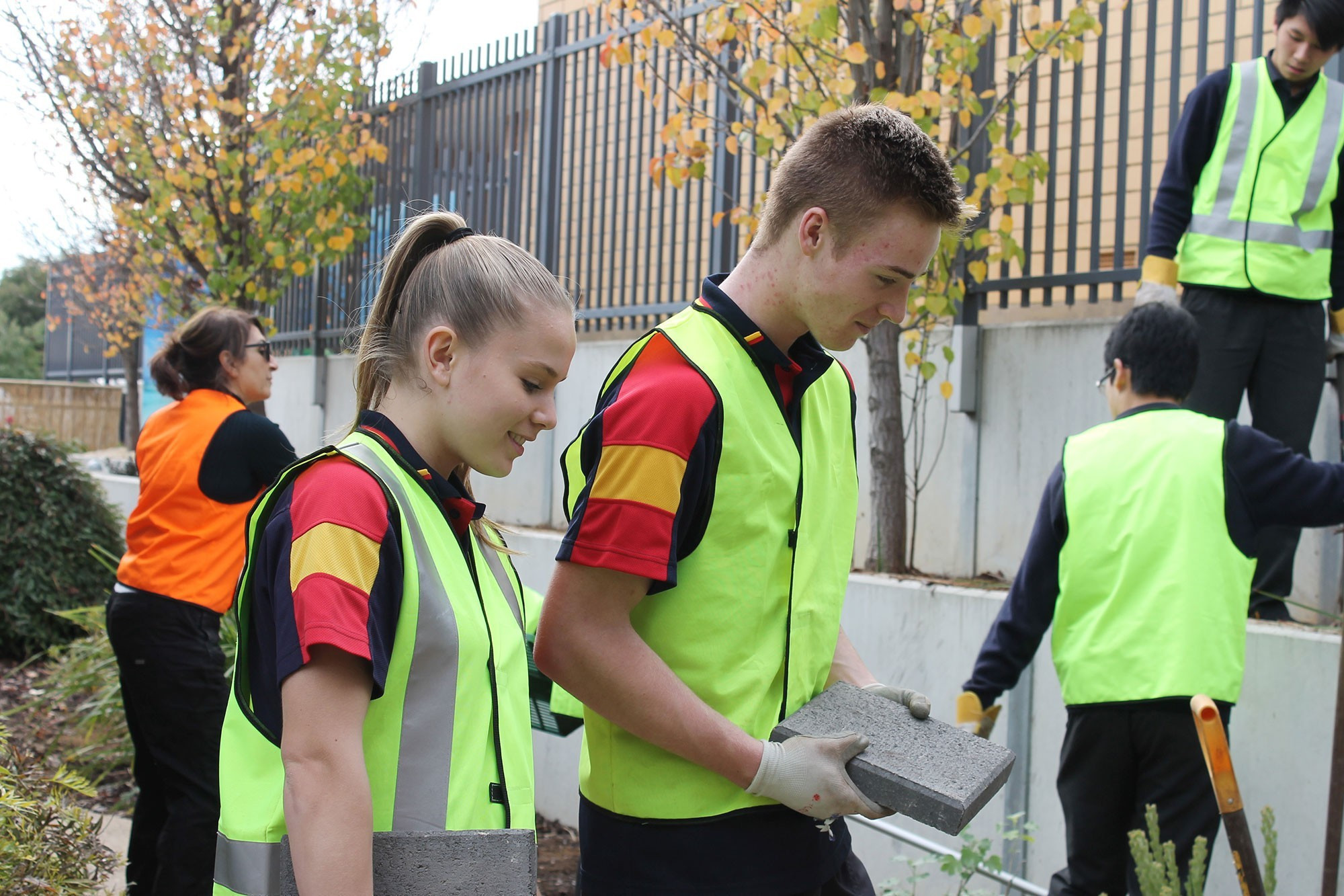<p>Shenae and Jyson were all sweat and smiles while working towards building a sensory garden for ACH Group Milpara.</p>
