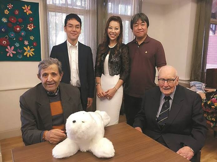 <p>Bottom L-R: Dementia residents Marcos and Keith, Top L-R: Yuji Miyoshi, GM Kowa Australia (PARO distributor), Christina Chia, EO Royal Freemasons, Prof. Takanori Shibata, inventor of PARO.</p>
