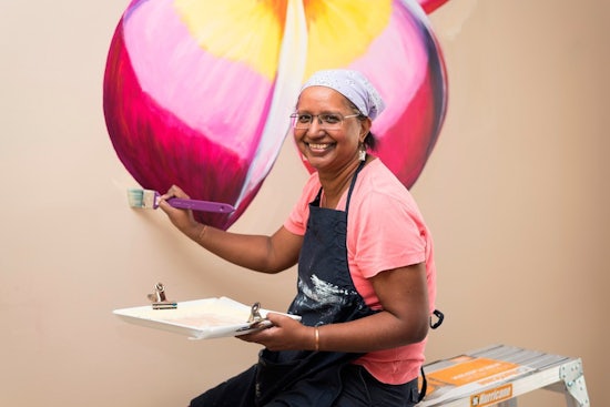 <p>Volunteer artist Jane Dacruz painting the first of 3 murals at a dementia care centre in Kinross.</p>
