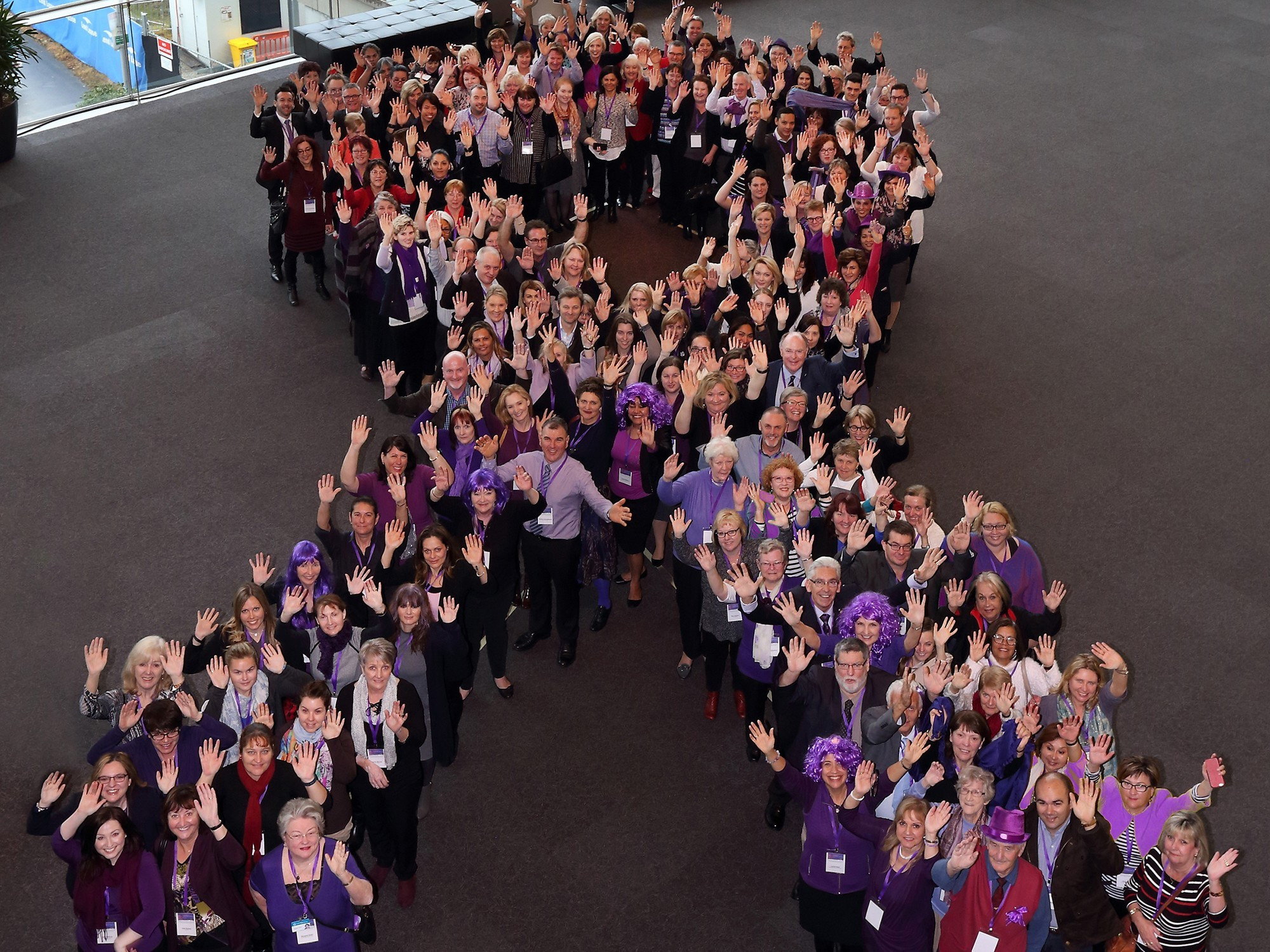 <p>Delegates dressed in purple and formed a purple ribbon at the World Elder Abuse Awareness Day Conference in Adelaide last week </p>
