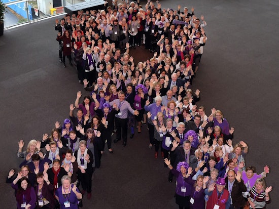 <p>Delegates dressed in purple and formed a purple ribbon at the World Elder Abuse Awareness Day Conference in Adelaide last week </p>
