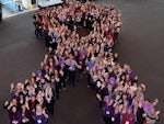 Delegates dressed in purple and formed a purple ribbon at the World Elder Abuse Awareness Day Conference in Adelaide last week