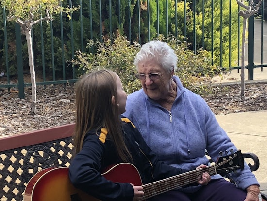<p>Kalyra Communities resident and a Montessori Middle School student coming together at Kalyra Woodcroft Aged Care (Source: Kalyra Communities)</p>
