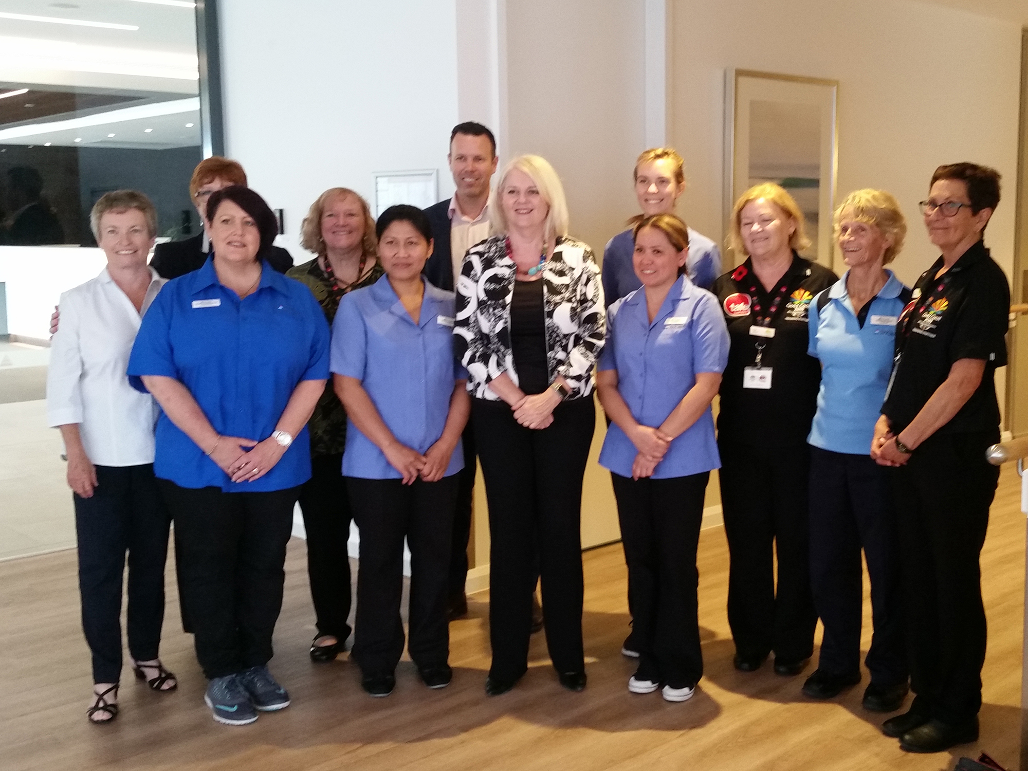 <p>Assistant Minister Andrews with TAFE Graduates and TriCare management (Source:TriCare)</p>
