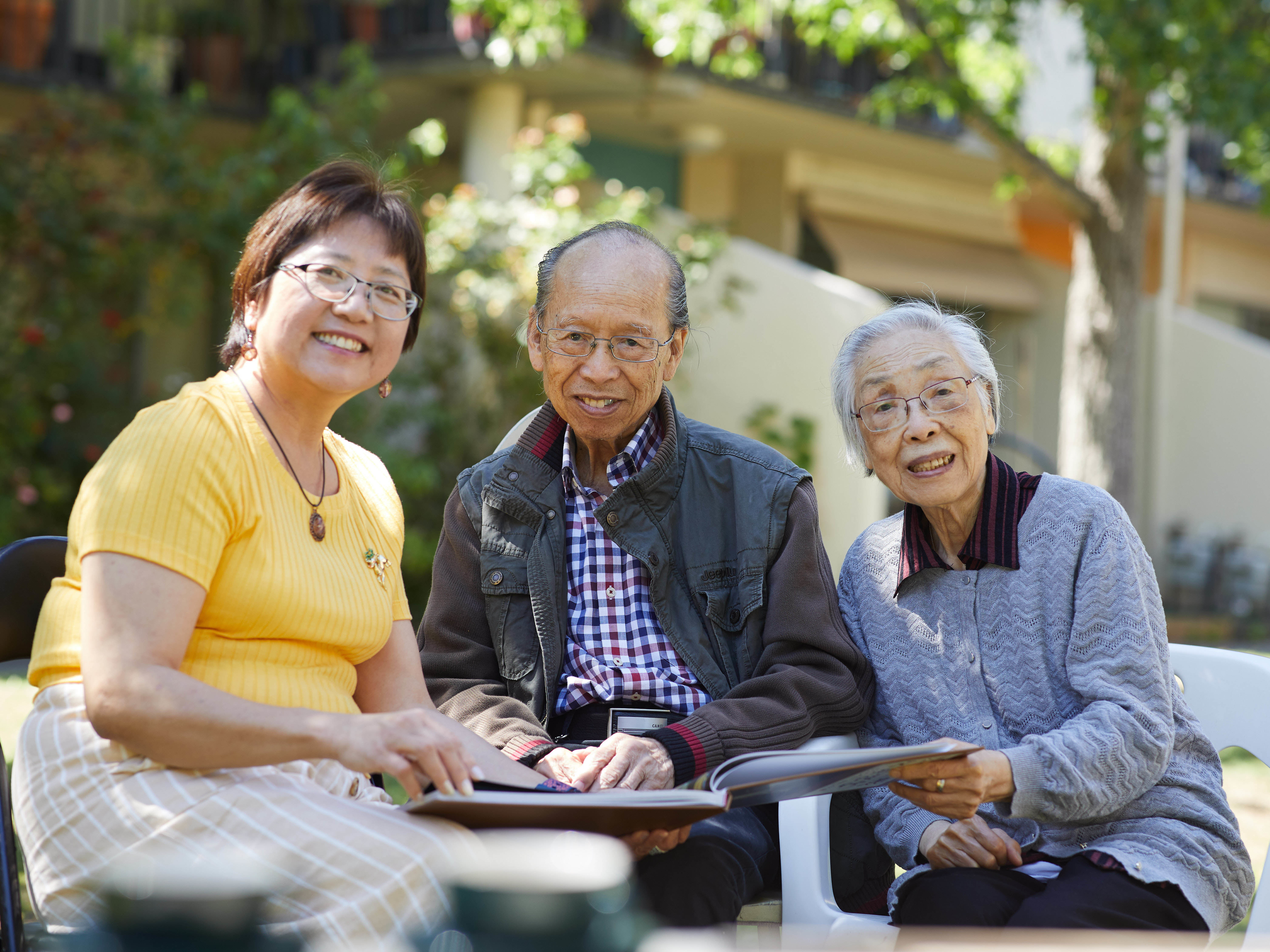 <p>Villa Maria Catholic Homes Case Manager and translator Amy Yuen with Yin Chen and his wife [Source: VMCH]</p>
