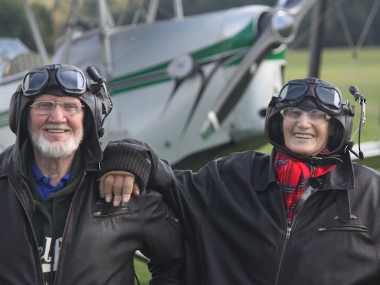 <p>Mercy Health residents Tony Hopkins and Eileen McNabb Tiger Moth flight bucket list experience (Source: Mercy Health)</p>
