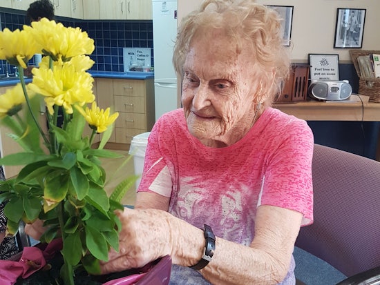 <p>Resident Joy enjoys sharing her knowledge in the weekly flower arranging sessions</p>
