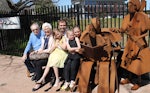 Artist Gerry McMahon with his parents and daughters alongside the sculpture