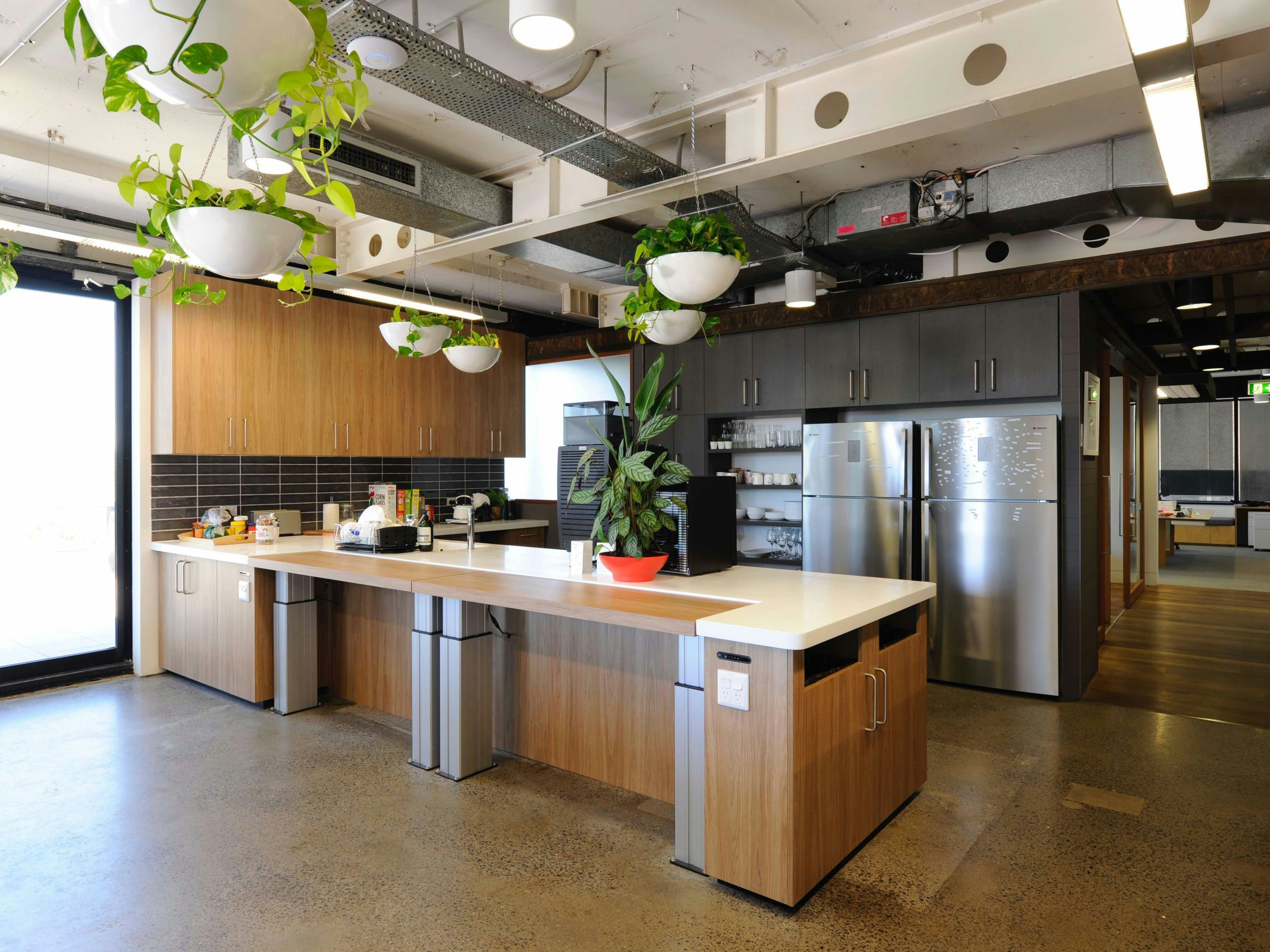 Hireup&#8217;s office features accessible kitchens complete with accessible kettles and microwaves and height adjustable benches [Source: Hireup]
