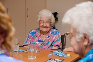 <p>Ruby playing bingo at Smithy’s Place.</p>
