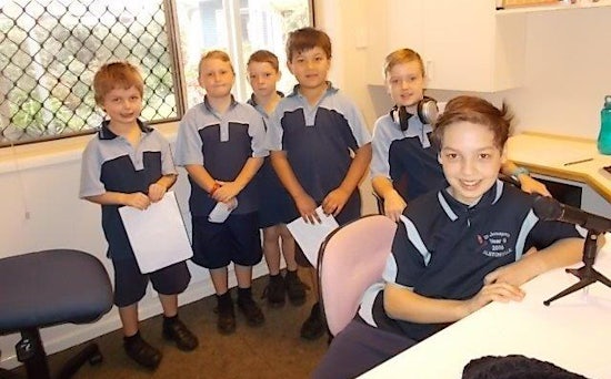 <p>Students from the radio club from St Joseph’s Catholic School present their program to residents each Wednesday</p>
