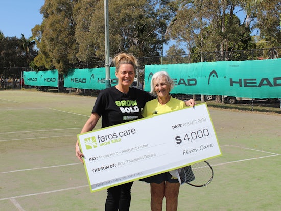 <p>Feros Care’s Tarnya Sim handing over the cheque to support 88 year old Margaret Fishe compete at the 2018 World Super Seniors Tennis Championship in Croatia (Source: Feros Care)</p>