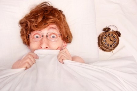 <p>man having nightmare in bed</p>
