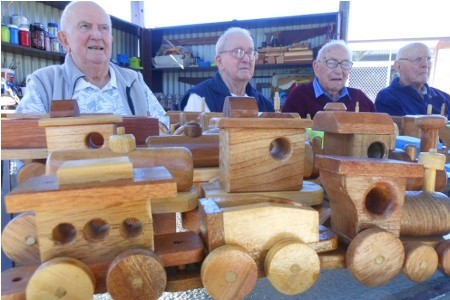 <p>Residents pictured with their woodwork for Seniors Week</p>
