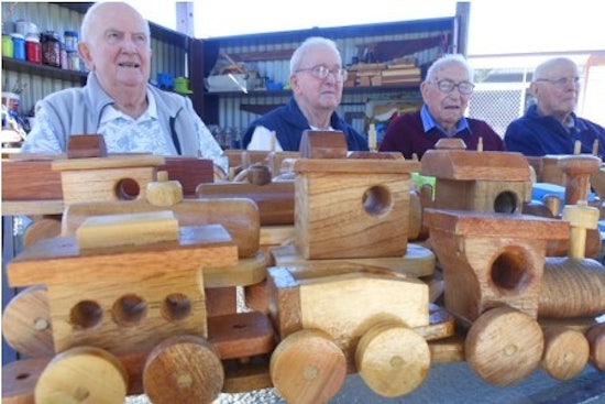 <p>Residents pictured with their woodwork for Seniors Week</p>
