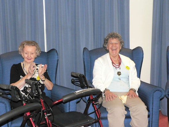 <p>Melbourne aged care residents, Phyllis, left, and Rose, have a giggle as part of the trials.</p>
