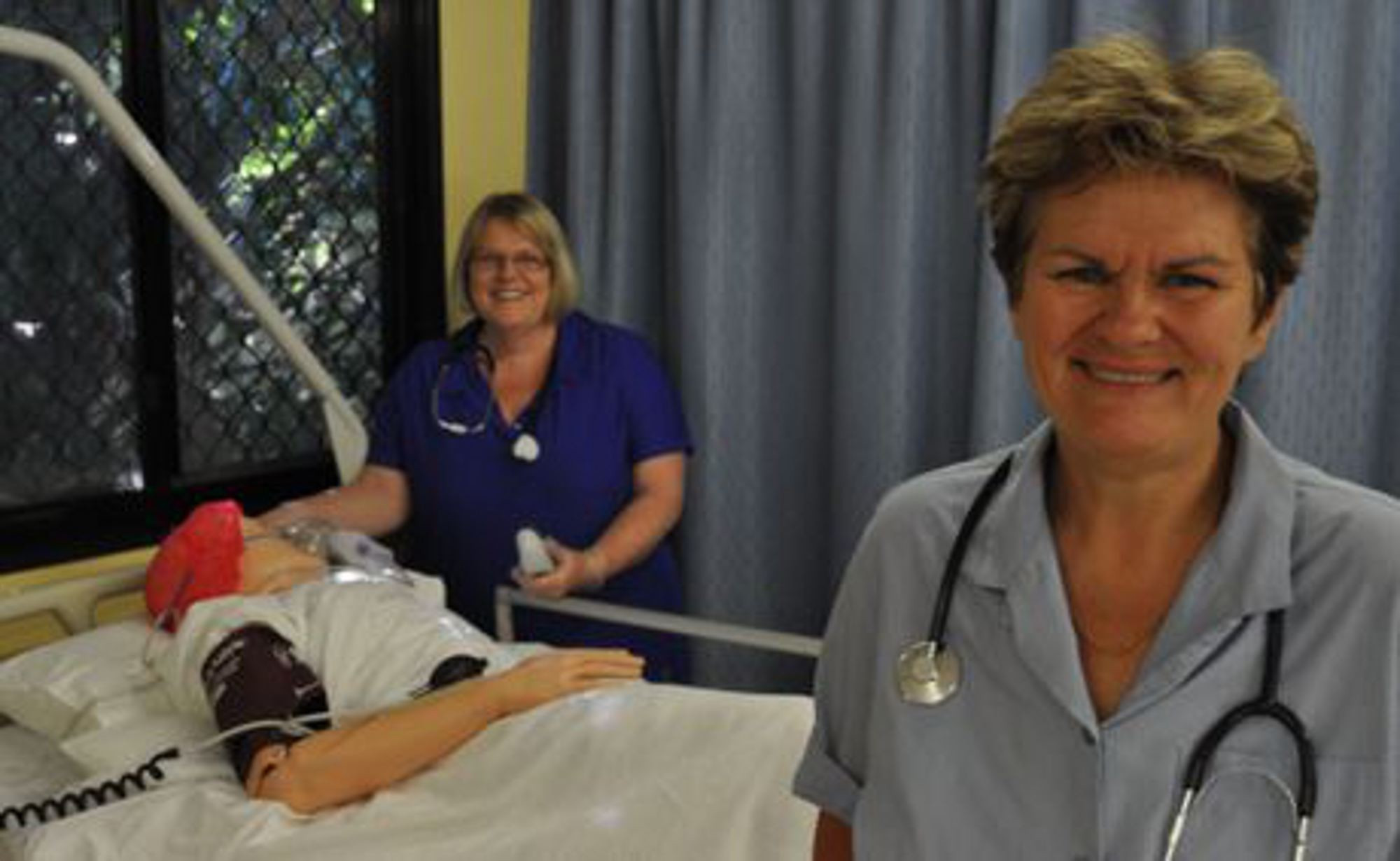 <p>Kay Ross, front, evaluated the national survey on the health and wellness of nurses.</p>
