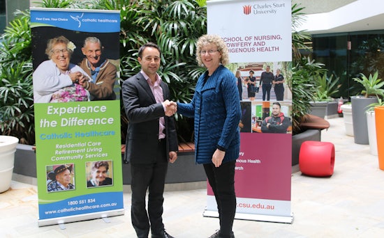 <p>Matthew Filocamo, Acting GM Residential Care Catholic Healthcare with Professor Catherine Hungerford from Charles Sturt University</p>
