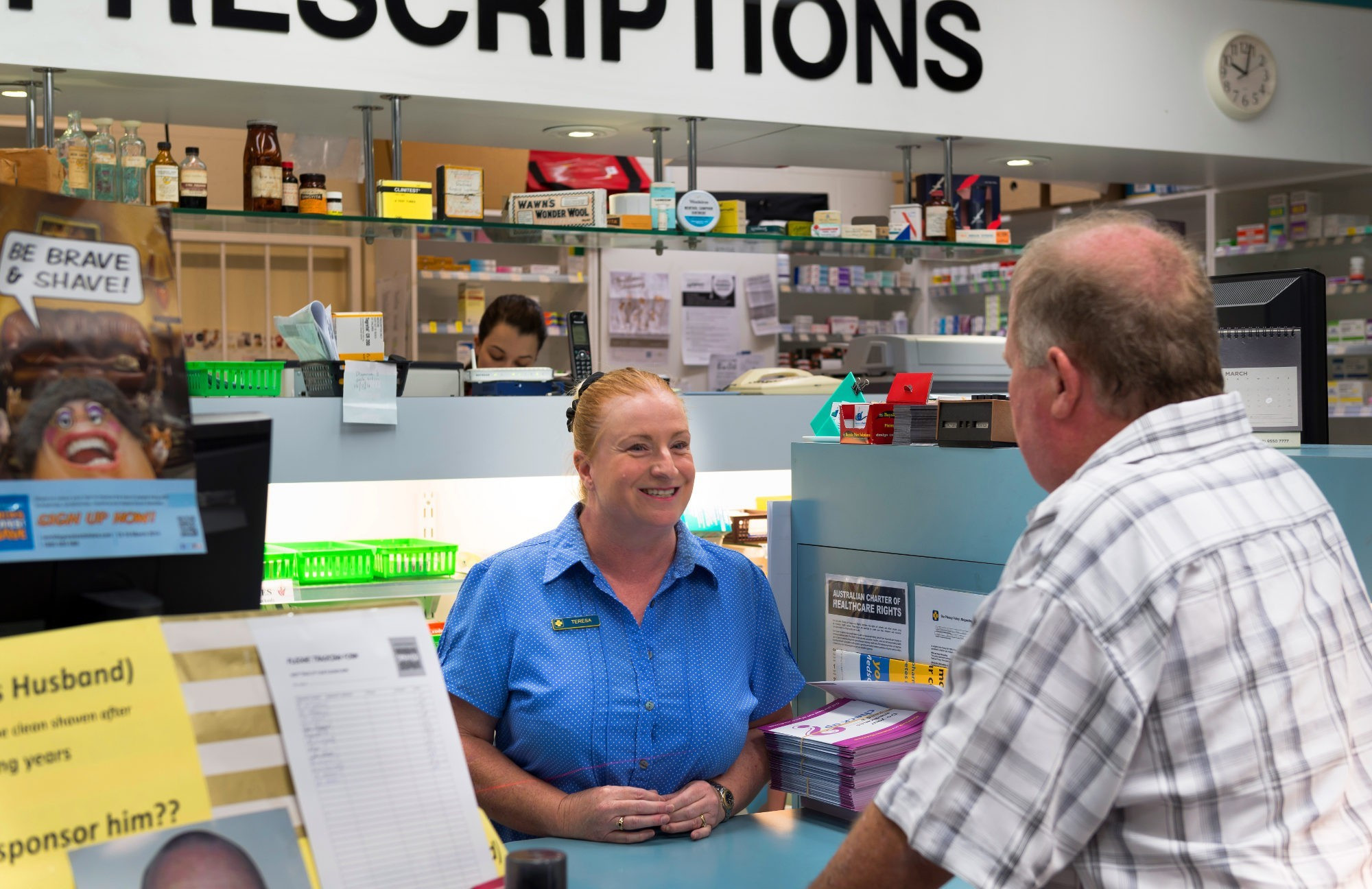 <p>Pharmacy assistant, Teresa Procter, with consumer Guy Dorries.</p>
