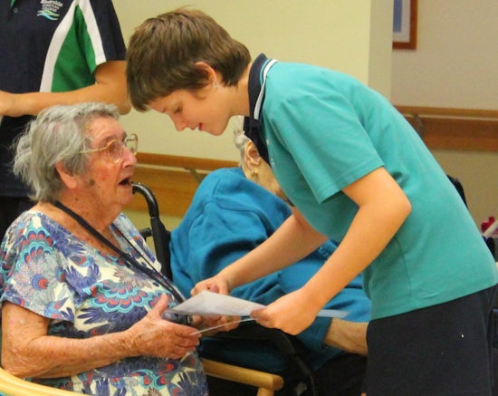 <p>Thirteen year old, Emily Dance, connects with PresCare resident, Maud. </p>
