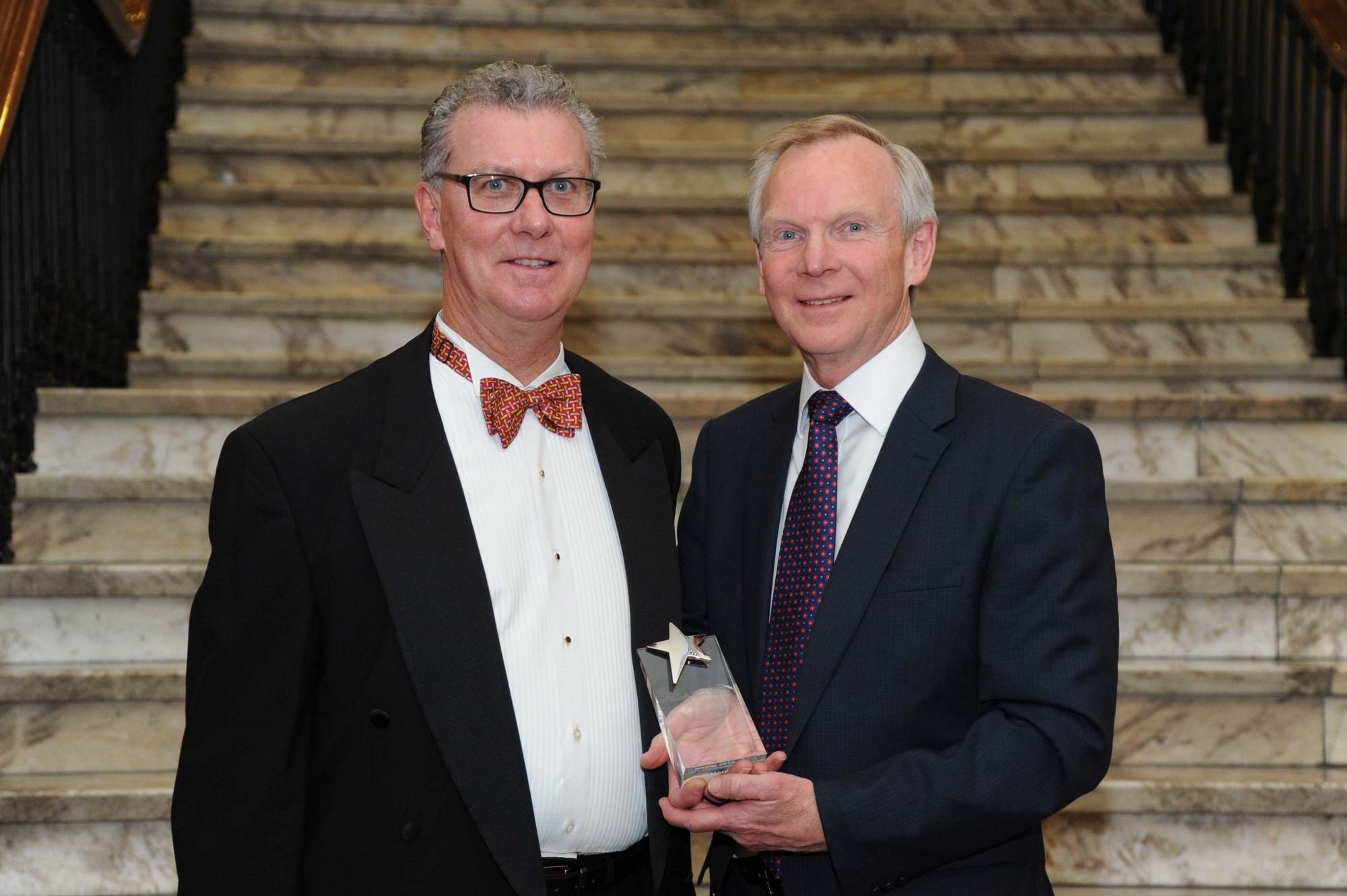 <p>Adjunct Professor John G Kelly, AM, ACSA chief executive, left, with award winner, Rob Hankins, chief executive of ECH.</p>
