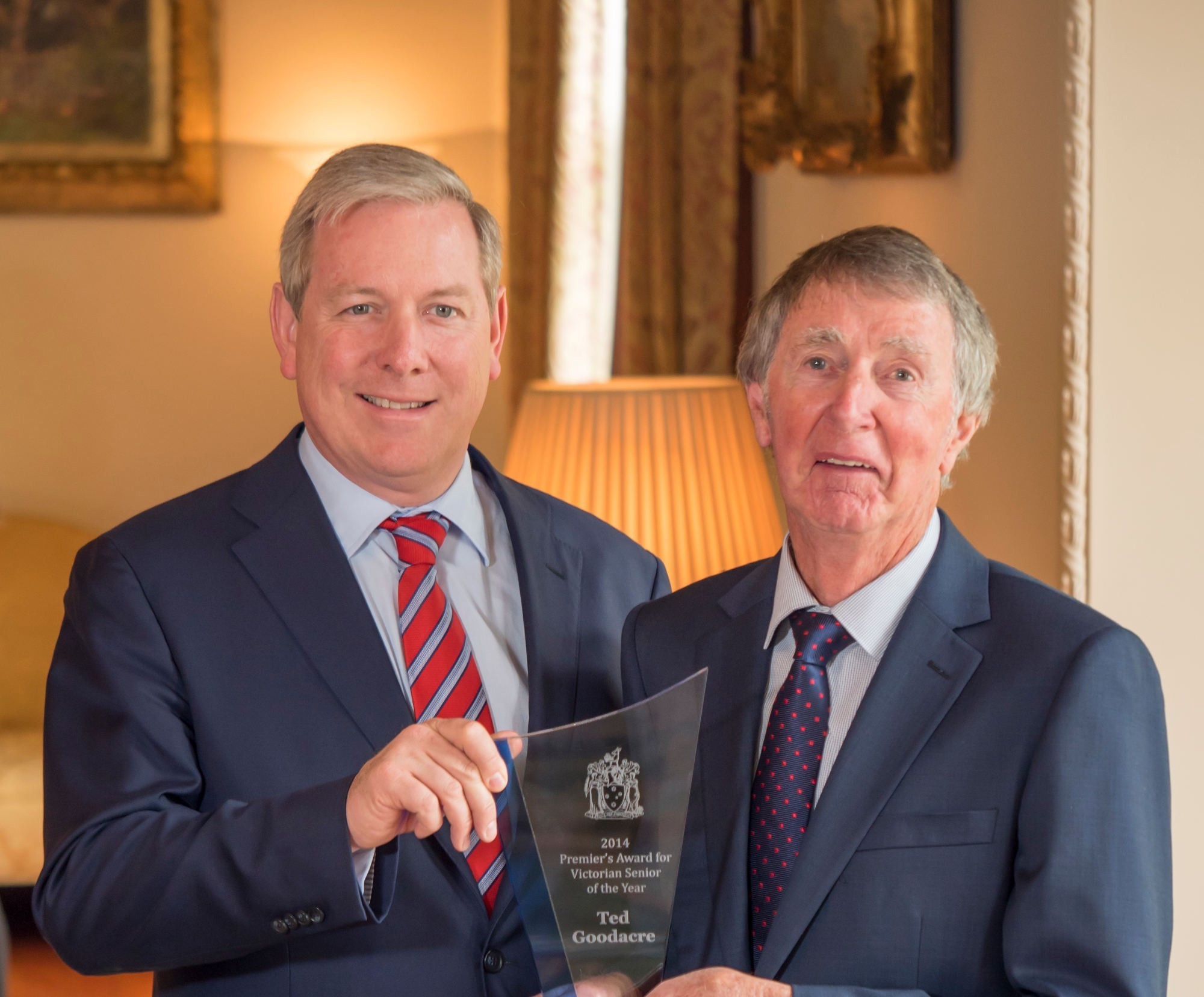 <p>Lismore stalwart, Ted Goodacre, (pictured right), is presented with his 2014 Victorian Senior of the Year award by Victorian Minister for Ageing, David Davis.</p>

