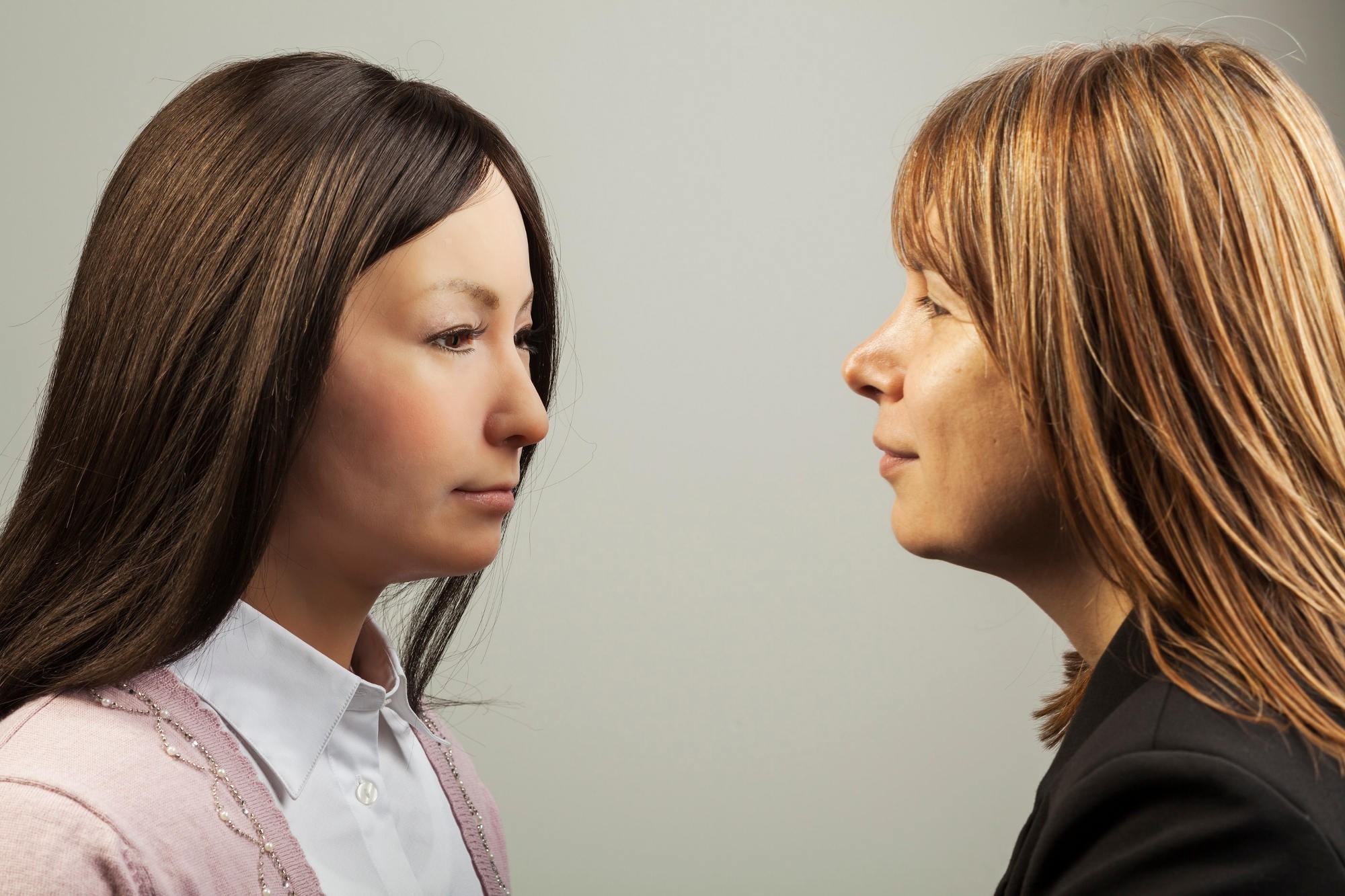 <p>Associate Professor Mari Velonaki (right) with Japanese robot, Geminoid F.</p>
