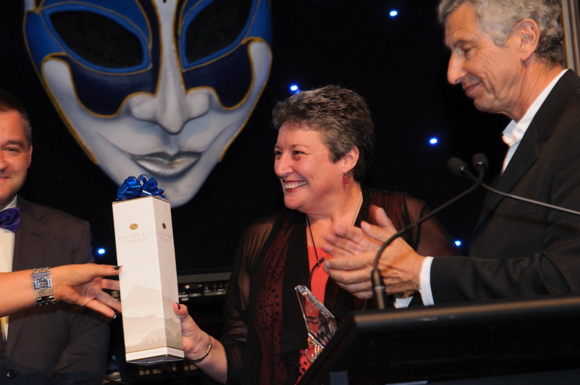 <p>Di Bennett, of Amana Living, is awarded as the driving force behind the implementation of the provider's new Home Care management system, with CEO Ray Glickman applauding to the right. </p>
