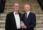 Rob Hankins, chief executive of ECH, right, accepts the Individual award at the 2014 ACSA awards, from Adjunct Professor John G Kelly, AM, ACSA chief executive in Adelaide a few months ago.