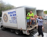Edgar Korenyovszky, Benetas facilities maintenance team leader, helps Bob Glindemann, from Rotary Donations In Kind, load items into the truck.