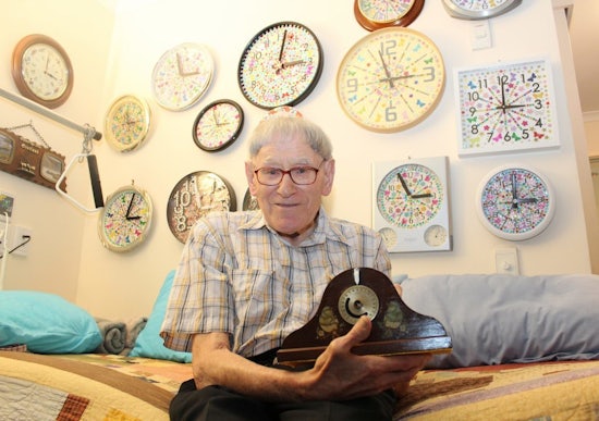 <p>Carinity resident Jock currently owns 76 analogue clocks which he makes and fixes. (Source: Carinity)</p>
