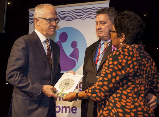 <p>The Healing Foundation’s Stolen Generations Reference Committee Chair Florence Onus and Board Chair Steve Larkin present the report to Prime Minister Malcolm Turnbull (Source: The Healing Foundation)</p>
