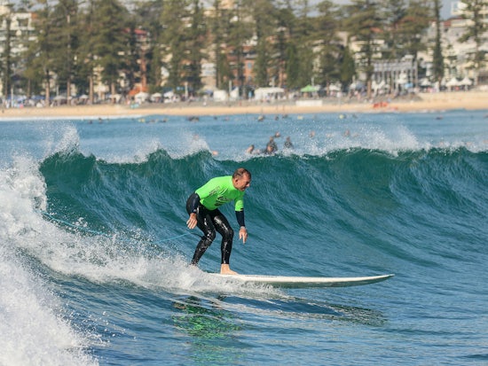 <p>Tony Abbott hits the surf (source: centre for healthy brain ageing)</p>
