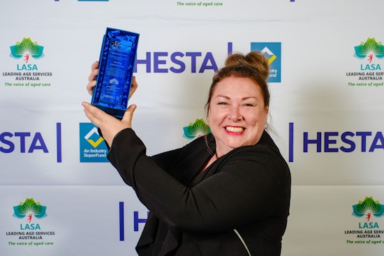<p>Vicki Bremer accepts the SA/NT organisation award on behalf of Uniting Communities at the LASA Excellence in Age Services Awards. (Source: LASA)</p>
