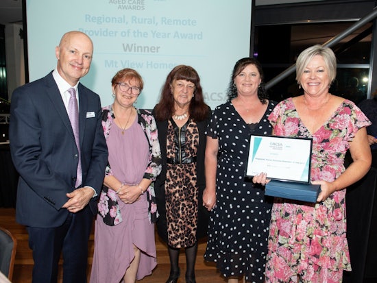 <p>Mt Views Homes receiving their State ACSA Award for RRR Provider of the Year on 22 October. Derek Dittrich, ACSA; and Mt Views team, Lisa, Ellen, Heather and CEO Jenny Deer. [Source: Shutterstock]</p>
