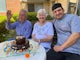 Baptistcare WA Residents, Krina Moor and Stan Kucel, with chef Akram Hamze and the Easter treat he baked. [Source: Supplied]
