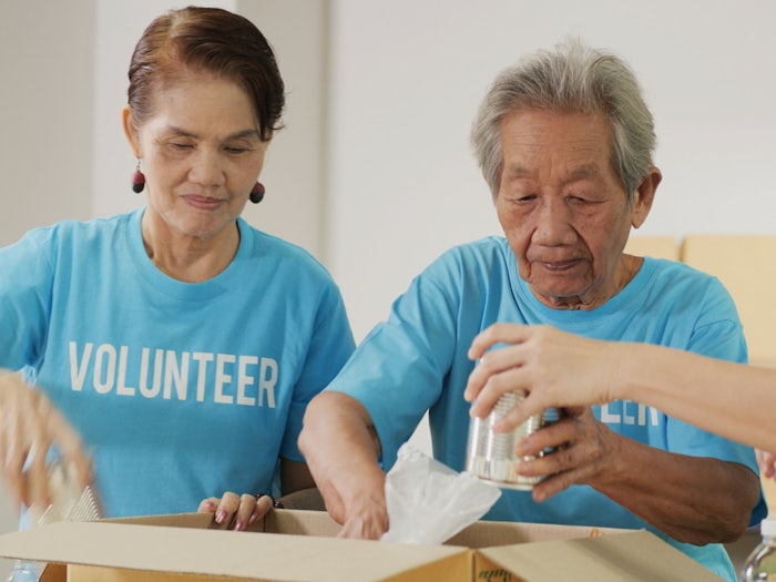Volunteering can provide older people with a sense of involvement, belonging, self worth, and purpose after retirement. [Source: Shutterstock]
