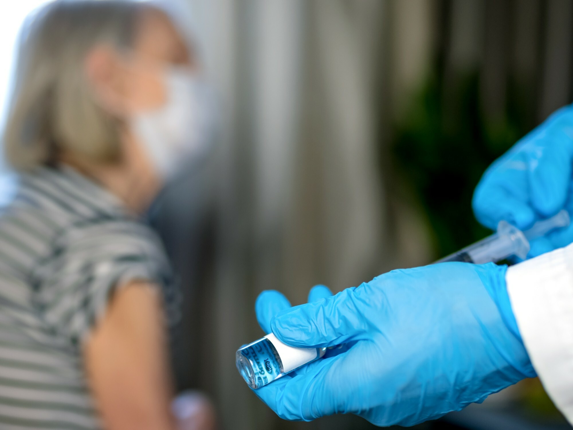 The booster shot is now a requirement if you want to be considered “up to date” with your COVID-19 vaccinations. [Source: Shutterstock] 
