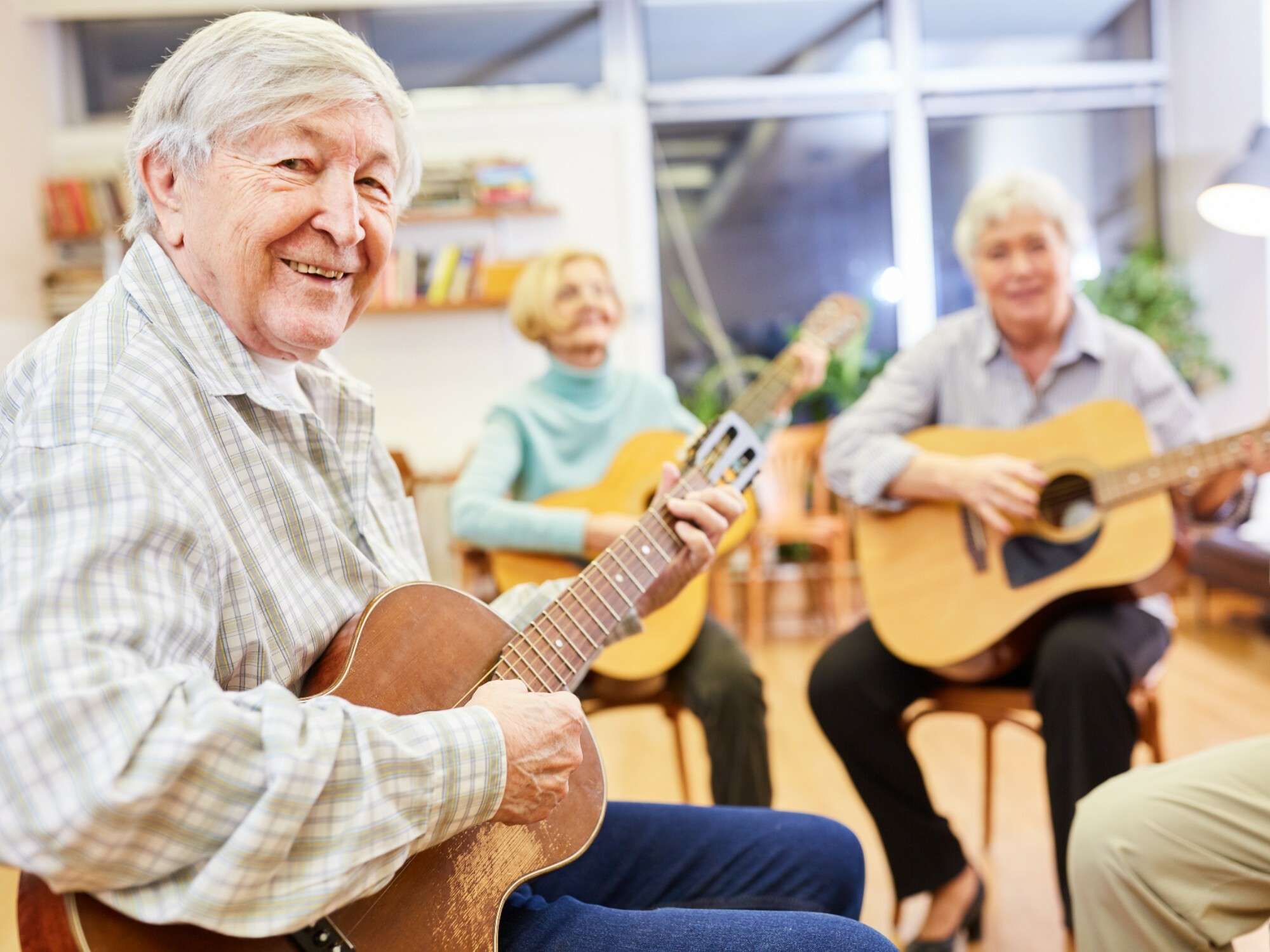 Music therapy can have positive health and wellbeing benefits on older people. [Source: Shutterstock]
