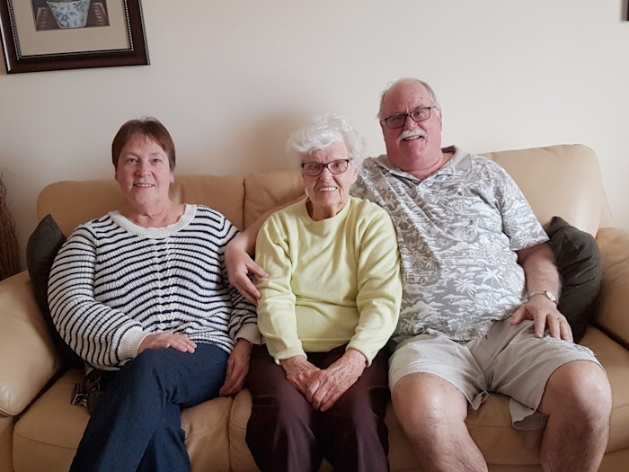 Sheryl and Rod Phin with their mother, Val, who utilise respite services. [Source: Supplied]
