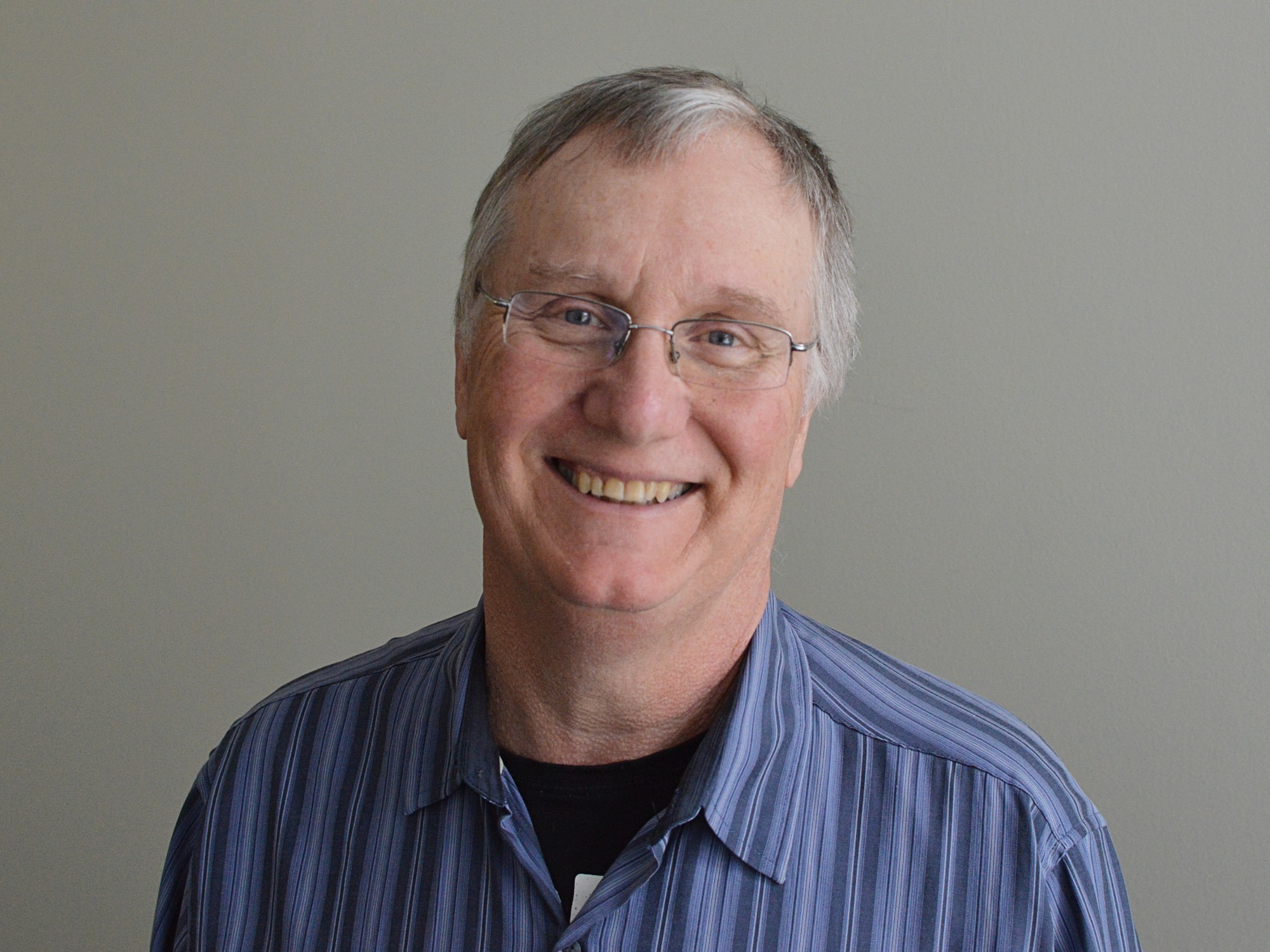 Typesetter/Designer of DPS, William Butcher. [Source: DPS]
