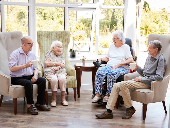 When living in a nursing home you can choose to socialise with other residents in the communal areas (Source: Shutterstock)
