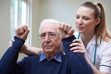 Old man with nurse.