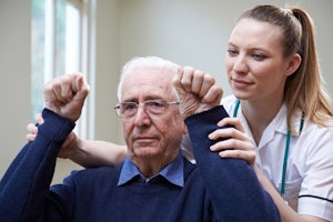 Old man with nurse.