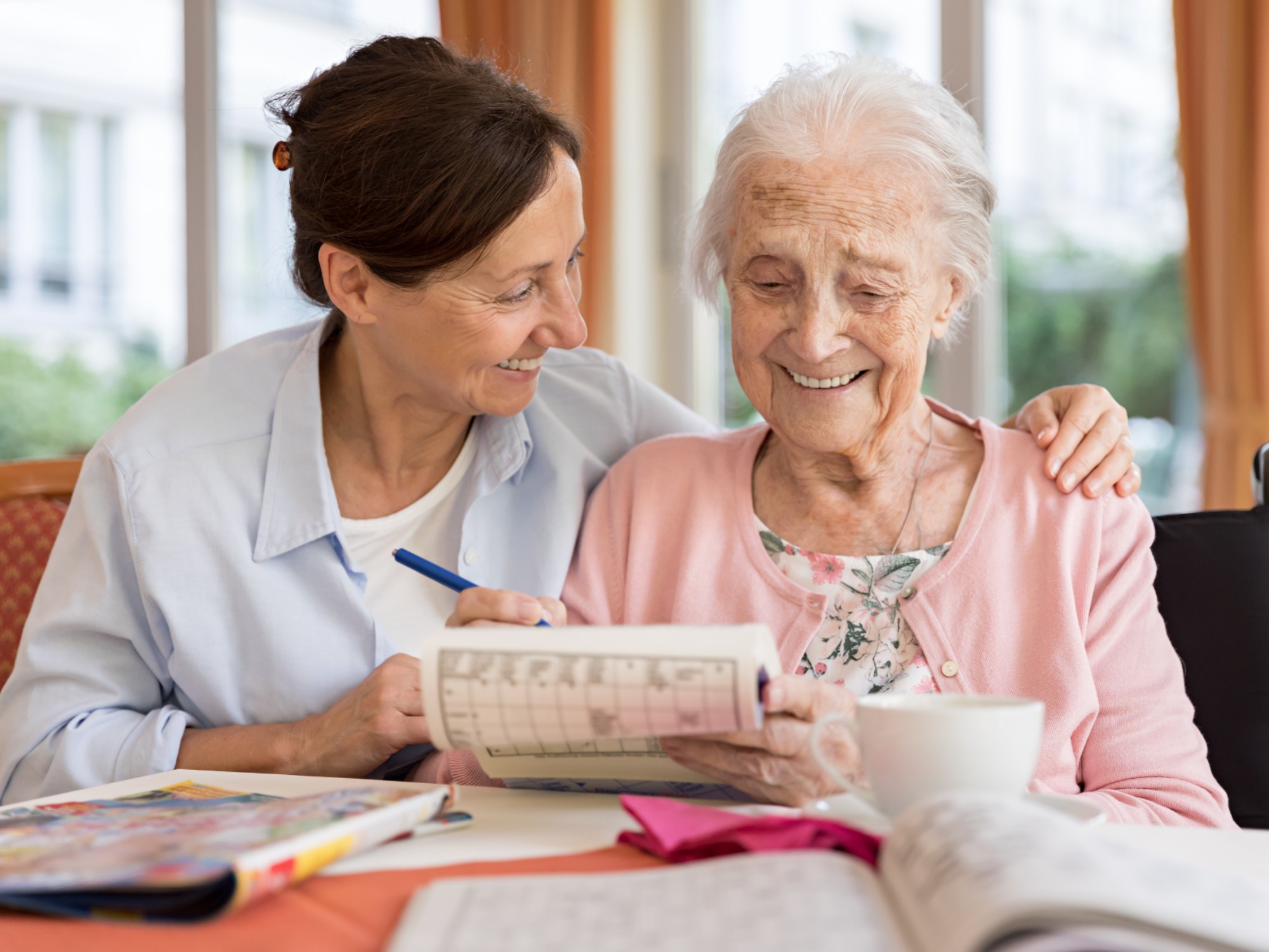 Social support can be as simple as having a support worker over for a cup of coffee or someone accompanying you out in the community.[Source: iStock]
