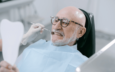 Older man in a dentist chair